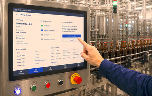 Production station touchscreen showing recipe deployment and version confirmation for a beverage filling line with glass bottles moving through the factory.